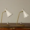 Pierce & Ward PAIR OF CREAM ENAMEL AND BRASS 1950S ITALIAN TABLE LAMPS WITH CURVED BRASS BASE | Lighting